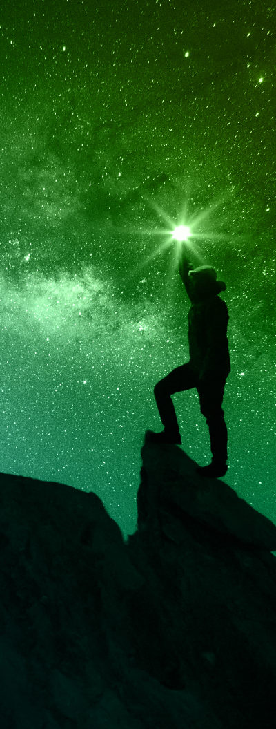 man reaching for the stars