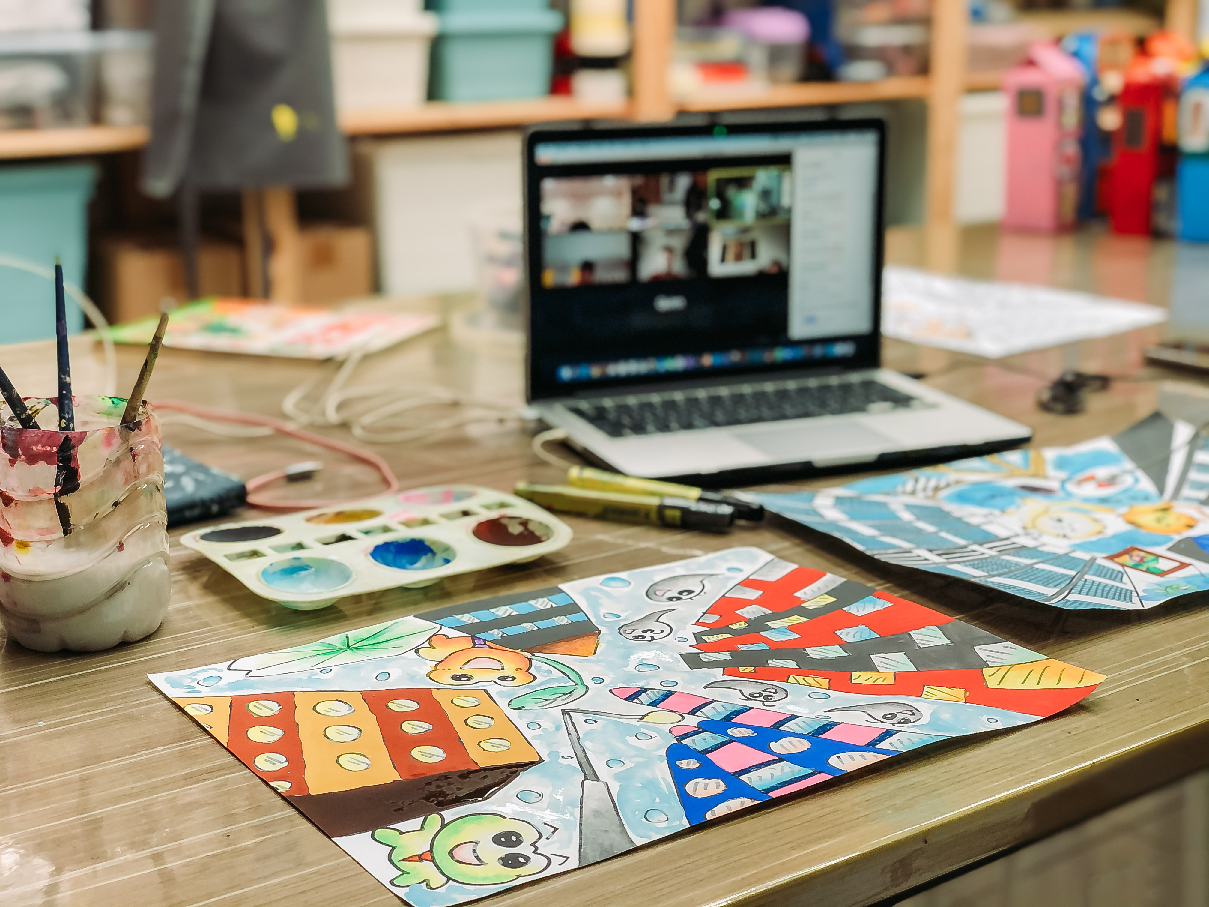 Asian chinese female teacher teaching online class at art school